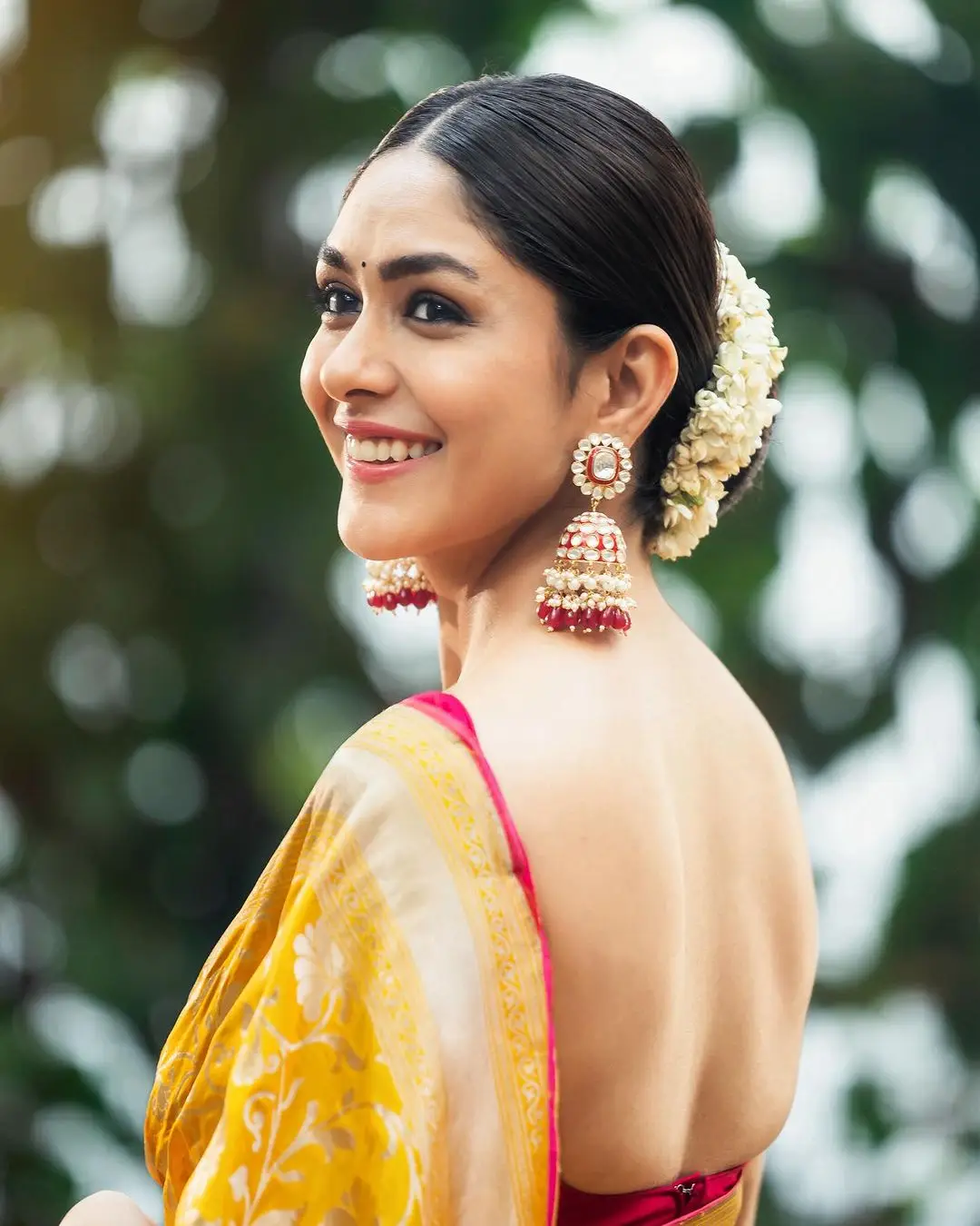 Mrunal Thakur Wearing Beautiful Earrings Yellow Saree Red Blouse